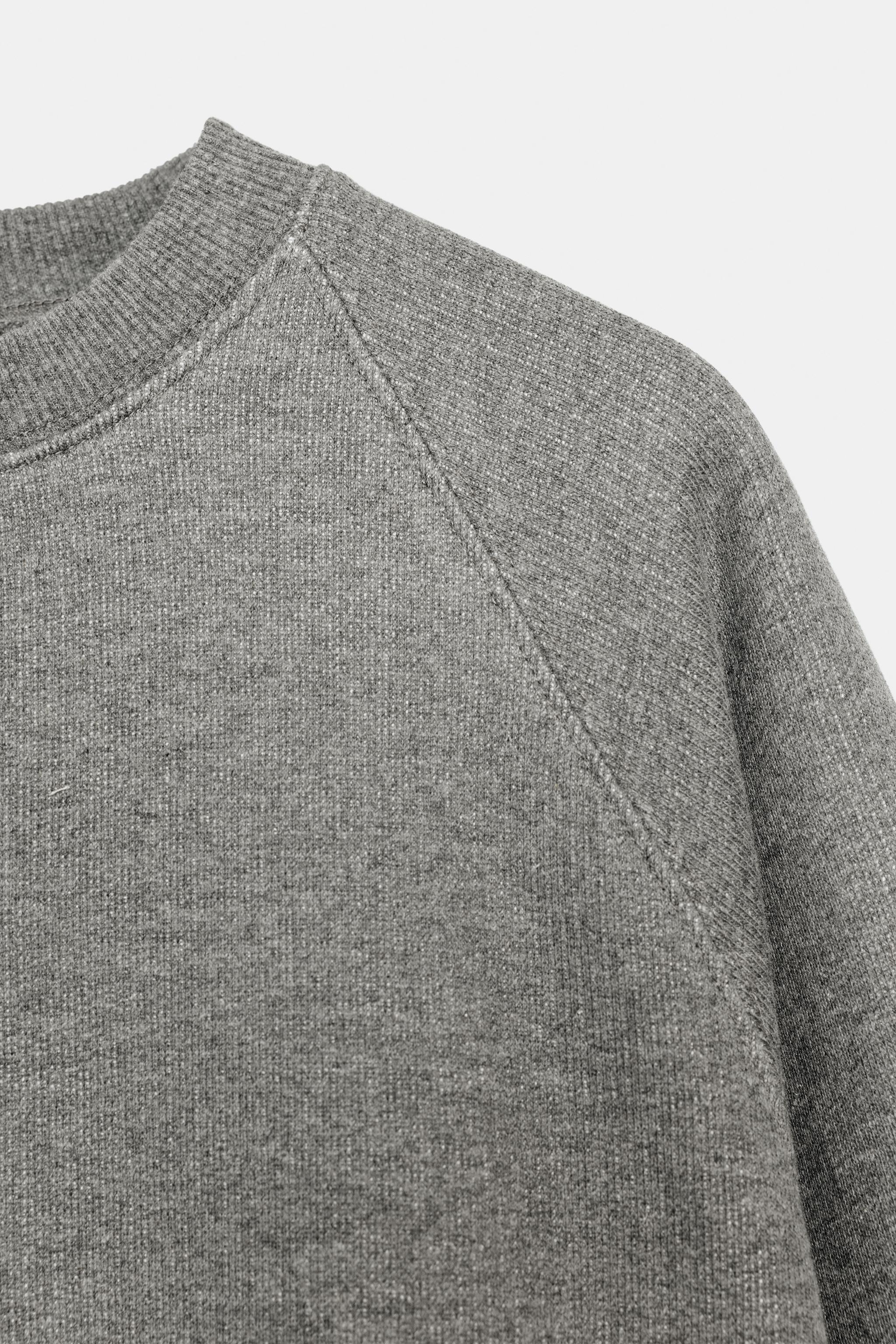 SWEAT OVERSIZE À BORD-CÔTE